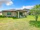 House with covered patio and spacious backyard at 278 Alford Dr, Davenport, FL 33896