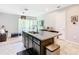 Kitchen island with granite countertop and stainless steel sink at 278 Alford Dr, Davenport, FL 33896