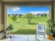 Spacious backyard with grassy area and neighborhood view at 278 Alford Dr, Davenport, FL 33896