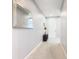 Bright entryway with mirror, console table, and carpeted floors at 278 Alford Dr, Davenport, FL 33896