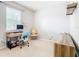 Home office with desk, chair, and built-in shelving at 278 Alford Dr, Davenport, FL 33896