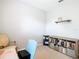 Home office with built-in shelving and comfortable seating at 278 Alford Dr, Davenport, FL 33896