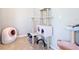 Charming cat room with cat tree, litter box, and scratching post at 278 Alford Dr, Davenport, FL 33896