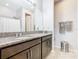 Modern bathroom with granite countertops and shower at 278 Alford Dr, Davenport, FL 33896