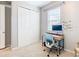 Home office featuring a workspace and built-in shelving at 278 Alford Dr, Davenport, FL 33896