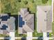 Aerial view of homes with solar panels at 278 Alford Dr, Davenport, FL 33896