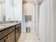 Clean bathroom with granite vanity and shower/tub combo at 278 Alford Dr, Davenport, FL 33896