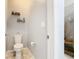 Simple bathroom with toilet and shower access at 278 Alford Dr, Davenport, FL 33896