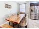 Bright dining room with a live edge wood table and modern chairs at 278 Alford Dr, Davenport, FL 33896