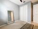 Bedroom with double door closet and mirror at 278 Alford Dr, Davenport, FL 33896