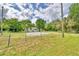 Single story home with chain link fence and large yard at 4590 San Heath Rd, Bartow, FL 33830
