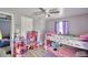 bedroom with bunk bed, toys, and ceiling fan at 4590 San Heath Rd, Bartow, FL 33830