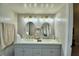 Modern bathroom with double vanity and updated lighting at 4590 San Heath Rd, Bartow, FL 33830
