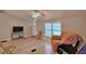 Relaxing living room with comfortable seating and a flat-screen TV at 4590 San Heath Rd, Bartow, FL 33830