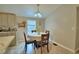 Cozy dining area with a four-person table and chair set at 4590 San Heath Rd, Bartow, FL 33830