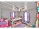 bedroom with bunk bed, dresser, and ceiling fan at 4590 San Heath Rd, Bartow, FL 33830