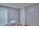 Small bedroom with window, closet and light gray walls at 4590 San Heath Rd, Bartow, FL 33830