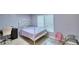 Bedroom with double bed, desk, and chair at 4590 San Heath Rd, Bartow, FL 33830