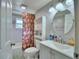 Updated bathroom with a vanity, toilet, and shower/tub combo at 4590 San Heath Rd, Bartow, FL 33830