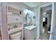 Bathroom features vanity, toilet, and view into another room at 4590 San Heath Rd, Bartow, FL 33830