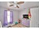 bedroom with twin bed, dresser, and ceiling fan at 4590 San Heath Rd, Bartow, FL 33830