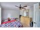 Bedroom with a queen bed, dresser, and ceiling fan at 4590 San Heath Rd, Bartow, FL 33830