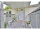 Inviting exterior with a covered porch and landscaping at 4590 San Heath Rd, Bartow, FL 33830