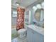 Updated bathroom with a vanity, toilet, and shower/tub combo at 4590 San Heath Rd, Bartow, FL 33830