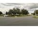 View of a quiet residential neighborhood with playground at 2510 Caliente Trl, Kissimmee, FL 34747