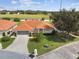 Aerial view of a single-Gathering home with a two-car garage at 142 Morning Glory Cir, Winter Haven, FL 33884