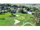 Aerial view showing home's location near golf course at 708 Canberra Rd, Winter Haven, FL 33884