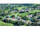 Aerial view of a house near a golf course at 708 Canberra Rd, Winter Haven, FL 33884