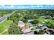 Aerial view of house and surrounding golf course community at 708 Canberra Rd, Winter Haven, FL 33884