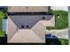 Aerial view showcasing home's roofline and landscaping at 708 Canberra Rd, Winter Haven, FL 33884