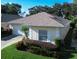Single-story home with landscaped yard and attached garage at 708 Canberra Rd, Winter Haven, FL 33884