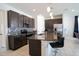 Modern kitchen with granite countertops and stainless steel appliances at 343 Lake Smart Cir, Winter Haven, FL 33881