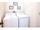 Bright laundry room with washer and dryer at 343 Lake Smart Cir, Winter Haven, FL 33881