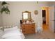 Charming bedroom with antique dresser and mirror at 3832 Traditions N Blvd, Winter Haven, FL 33884