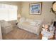 Cozy bedroom with daybed and window seat at 3832 Traditions N Blvd, Winter Haven, FL 33884