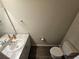 Clean and modern bathroom with vanity and toilet at 991 First Dr, Eagle Lake, FL 33839