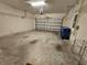 Two-car garage with extra storage at 991 First Dr, Eagle Lake, FL 33839