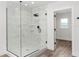 Large walk-in shower with marble tile and glass enclosure at 5303 Tillman Rd, Lakeland, FL 33810