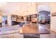 Open kitchen with large island and stainless steel appliances at 34415 Kingfish St, Fruitland Park, FL 34731