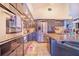 Sleek kitchen with stainless steel appliances and dark cabinetry at 34415 Kingfish St, Fruitland Park, FL 34731