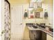 Bathroom with a single sink vanity, shower, and toilet at 34415 Kingfish St, Fruitland Park, FL 34731