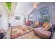 Comfortable living room with a brown sectional sofa and large window at 34415 Kingfish St, Fruitland Park, FL 34731