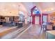 Open concept kitchen and dining area with an island and hardwood floors at 34415 Kingfish St, Fruitland Park, FL 34731