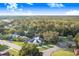 Aerial view showcasing home's location in a quiet neighborhood at 34415 Kingfish St, Fruitland Park, FL 34731
