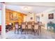 Formal dining room with large wooden table and chairs at 34415 Kingfish St, Fruitland Park, FL 34731