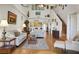 Open concept living room with high ceilings and hardwood floors at 35 Enclave Dr, Winter Haven, FL 33884